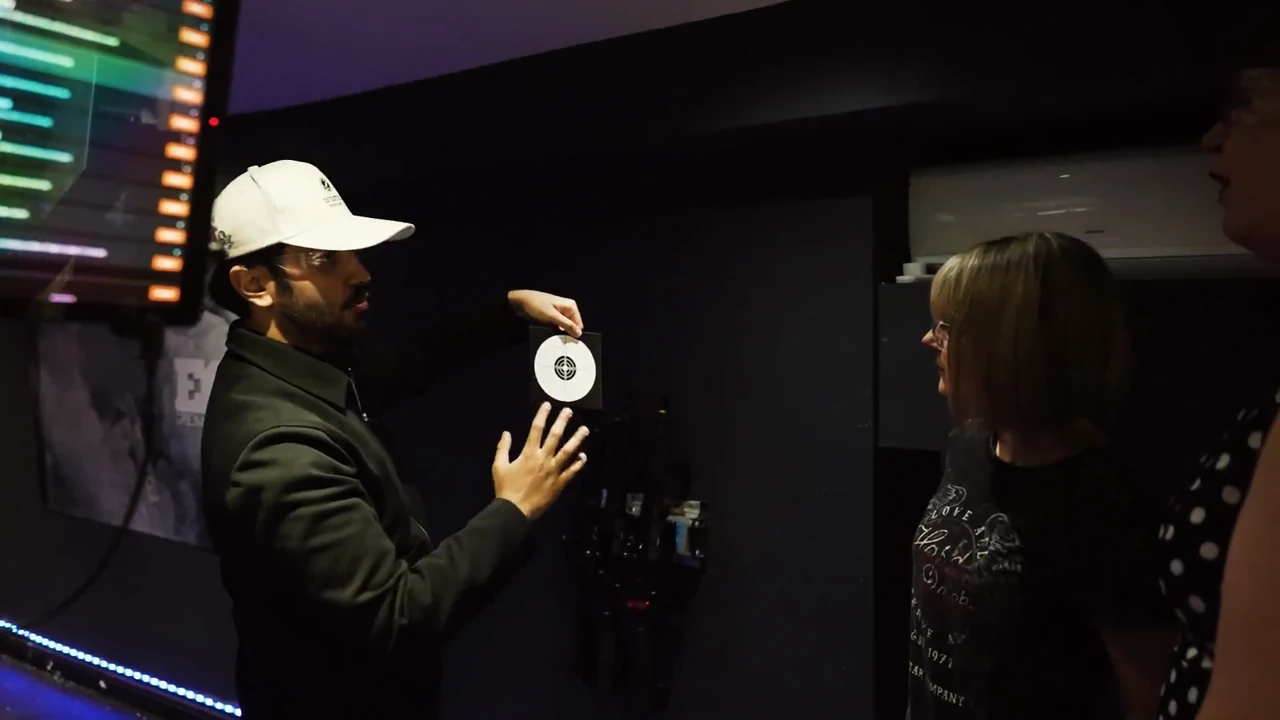 Camden visitors receiving target shooting guidance